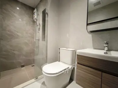 Modern bathroom with sleek design and glass shower enclosure