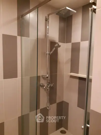 Modern bathroom with sleek shower design and glass enclosure