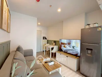 Modern living room with cozy sofa, sleek TV unit, and dining area in open layout.