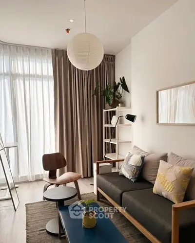 Stylish living room with modern furniture and natural light