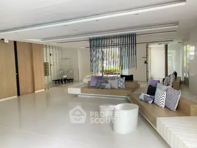 Modern living room with stylish decor and ample natural light
