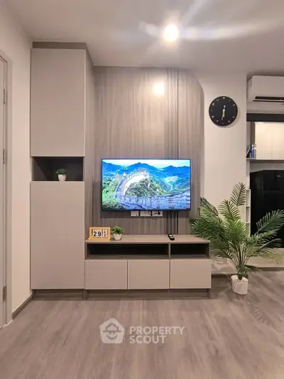 Modern living room with sleek TV unit and stylish decor