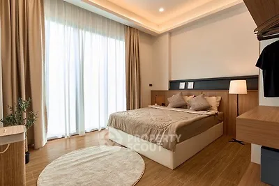 Modern bedroom with cozy decor and natural light