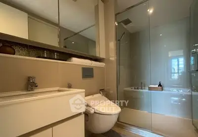 Modern bathroom with sleek design and glass shower enclosure