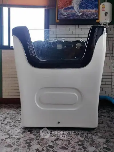 Modern bathroom with unique bathtub and stylish tile flooring