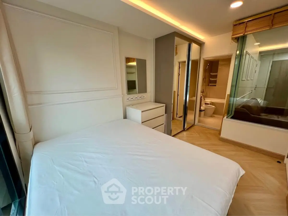 Modern bedroom with ensuite bathroom and stylish decor