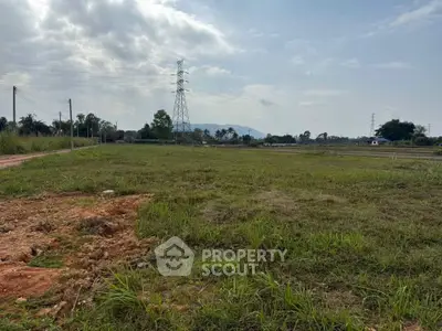 Expansive land plot with scenic mountain views, perfect for development or investment opportunities.