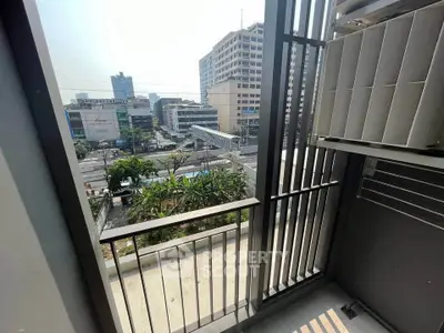Modern balcony with city view, perfect for urban living enthusiasts.