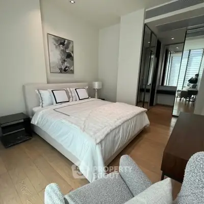 Luxurious modern bedroom with elegant decor and ample natural light