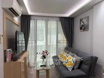 Modern living room with stylish decor and natural light