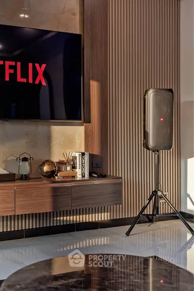 Modern living room with stylish decor and entertainment setup