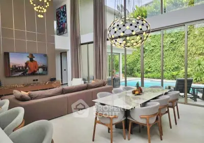 Luxurious modern living room with high ceilings, stylish chandelier, and pool view.