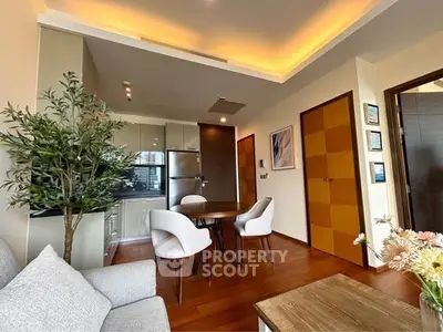 Modern living room with open kitchen and stylish decor
