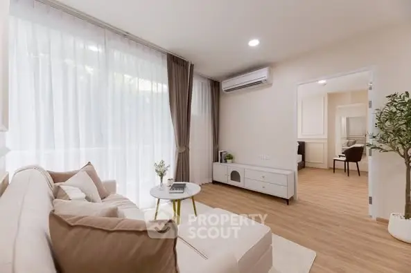 Bright and cozy living room with modern decor and natural light