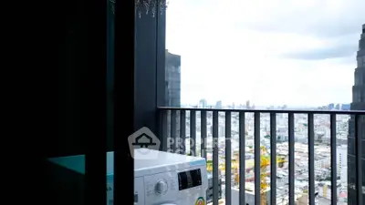 Modern balcony with city view and washing machine