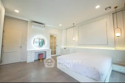 Luxurious modern bedroom with elegant lighting and stylish decor