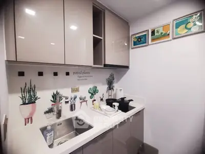 Modern kitchen with stylish decor and sleek cabinetry