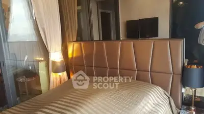 Luxurious bedroom with modern decor and elegant lighting