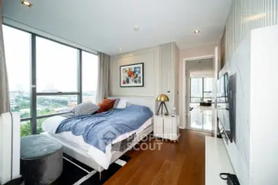 Luxurious bedroom with stunning city view and modern decor