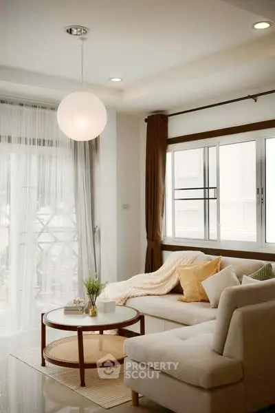 Cozy living room with modern decor and natural light