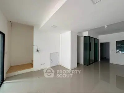Spacious modern interior with sleek design and ample natural light, perfect for customization.