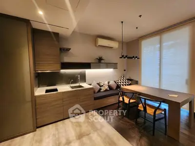 Modern kitchen with sleek design and cozy dining area