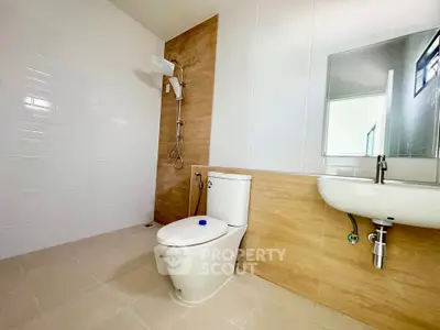 Modern bathroom with sleek fixtures and stylish tile design