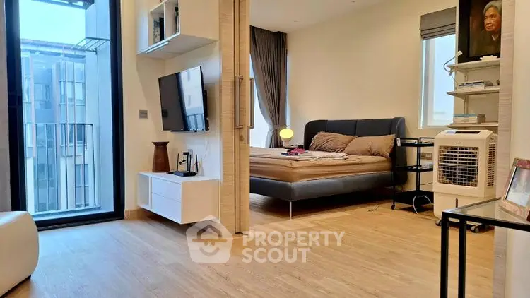 Modern bedroom with balcony view and stylish decor