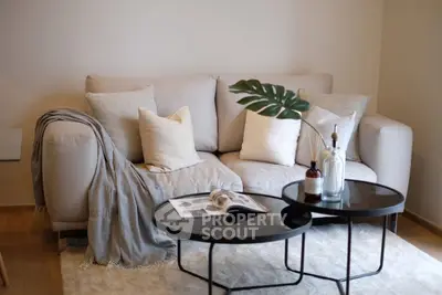 Cozy living room with modern sofa and stylish coffee tables