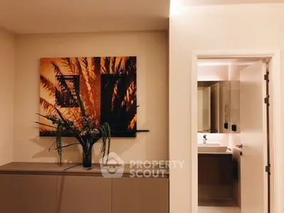 Stylish interior with modern decor and elegant bathroom view, perfect for contemporary living.