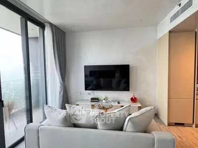 Modern living room with sleek design and balcony view
