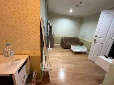 Cozy living room with modern decor and wooden flooring