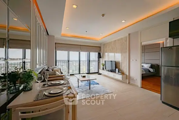 Modern living room with open layout and balcony view in luxury apartment.