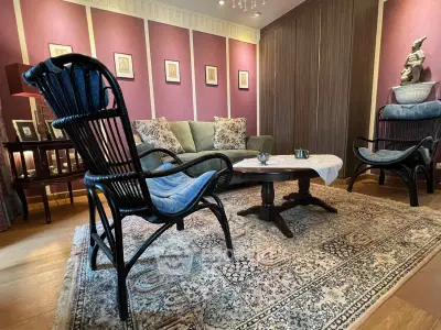 Charming living room with elegant decor and cozy seating area, perfect for relaxation.