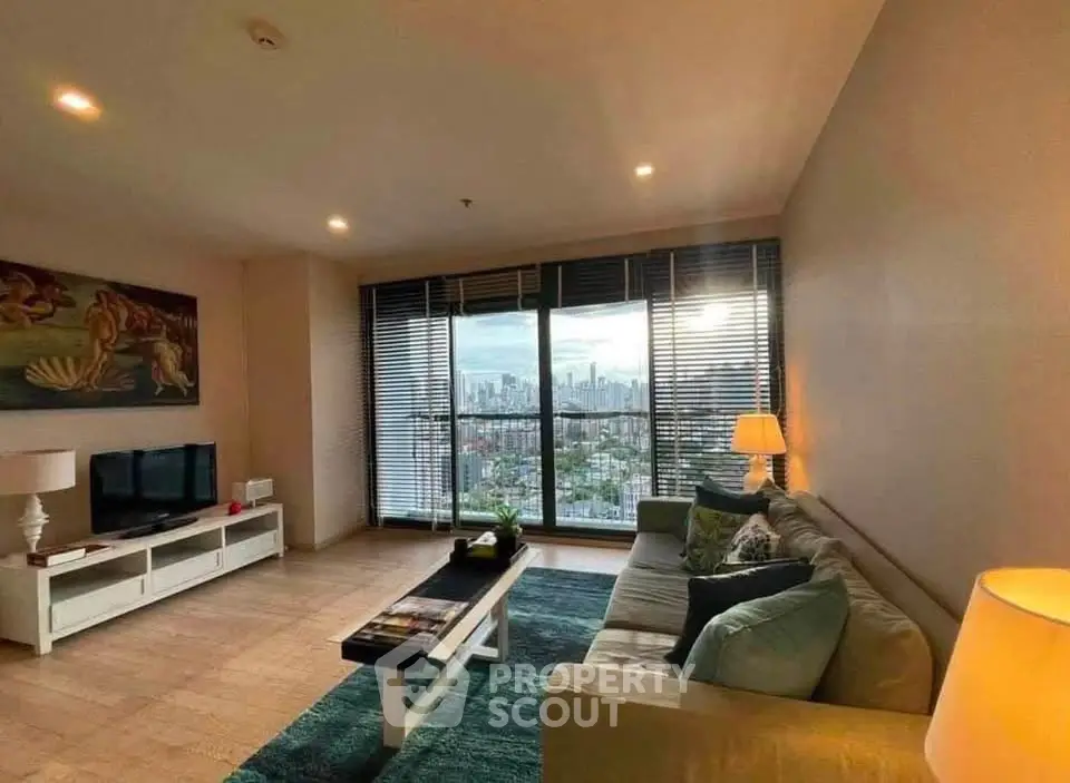Spacious living room with stunning city view and modern decor