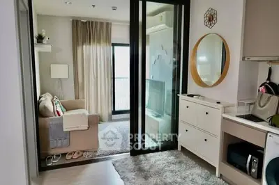 Modern apartment living room with cozy decor and sliding glass doors