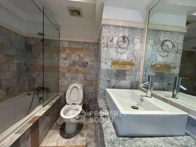 Luxurious marble bathroom with modern fixtures and elegant design