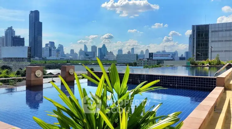 Stunning rooftop pool with breathtaking city skyline view