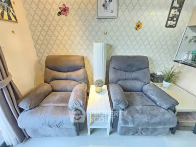 Cozy living room with plush recliners and stylish decor