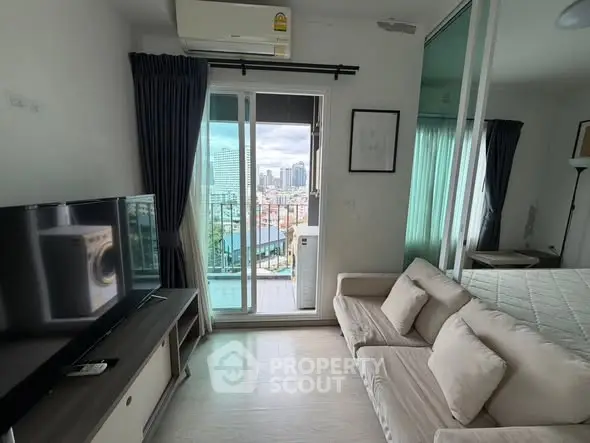 Modern living room with balcony view in urban apartment