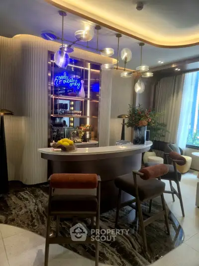 Luxurious modern living room with stylish bar area and elegant lighting