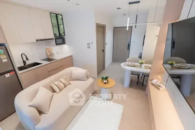 Modern living room with cozy sofa and stylish dining area in open layout apartment.