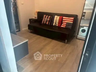 Cozy living room with modern decor and washing machine