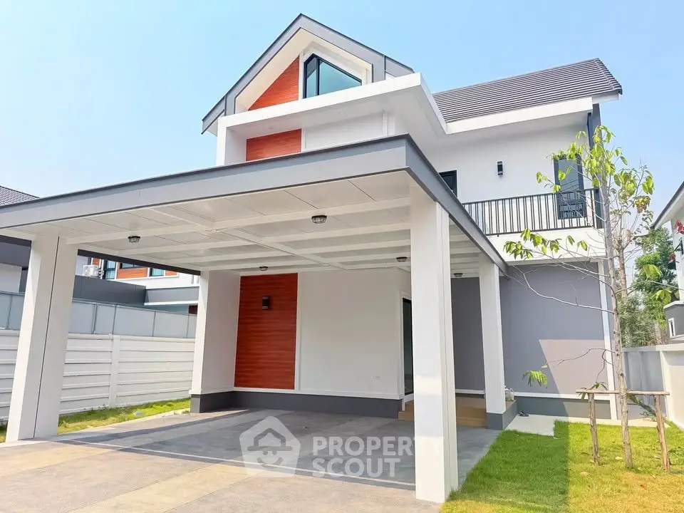 Modern two-story house with spacious carport and stylish facade