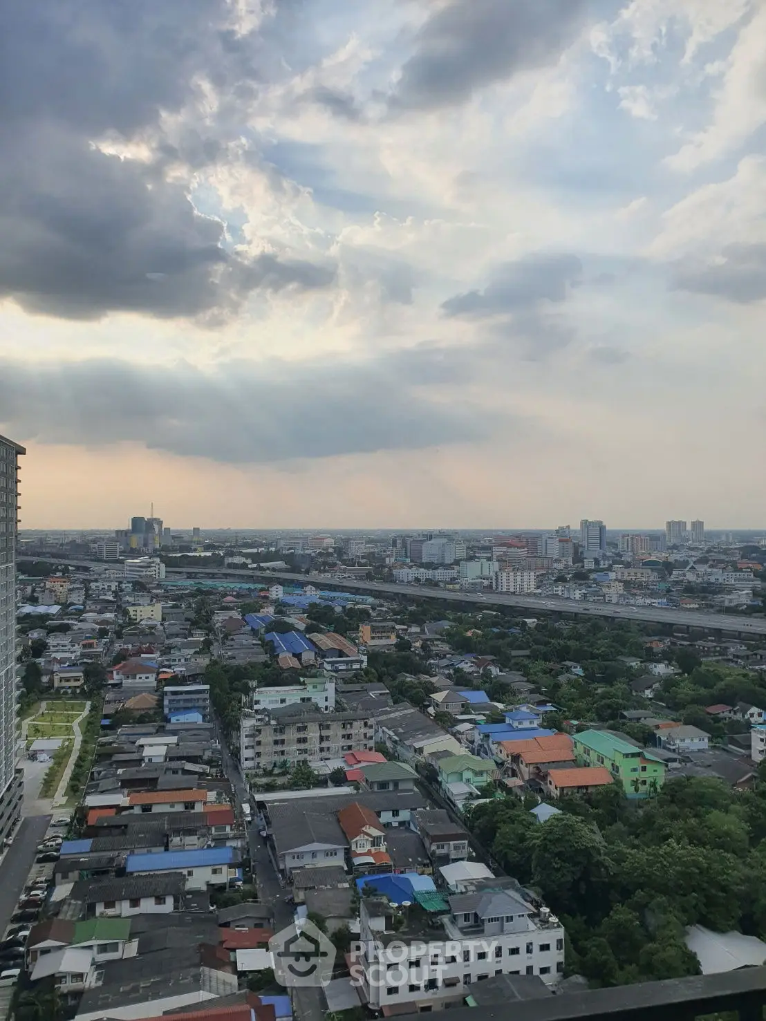 Stunning cityscape view from high-rise building showcasing urban landscape and skyline.