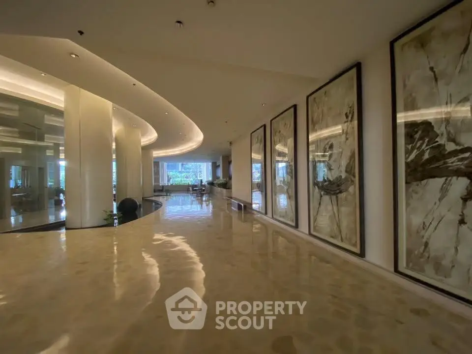 Luxurious building entrance with elegant decor and polished floors