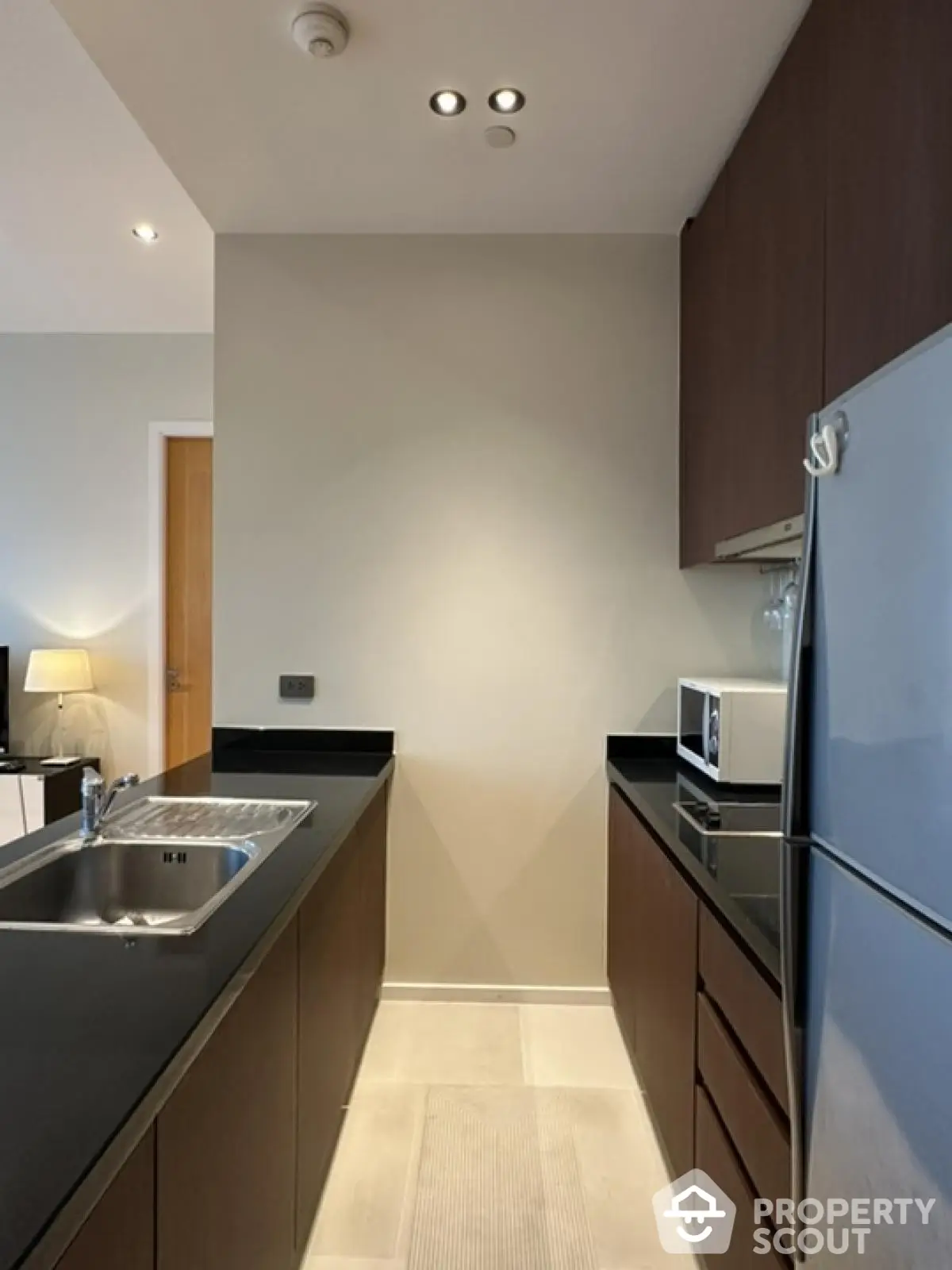 Modern kitchen with sleek cabinetry and stainless steel appliances