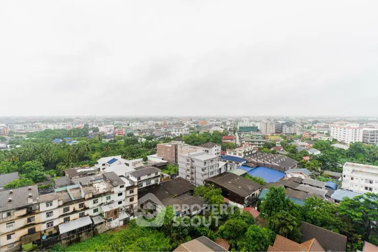 Panoramic cityscape view showcasing diverse residential buildings and lush greenery.