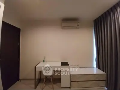 Modern study room with sleek desk and air conditioning