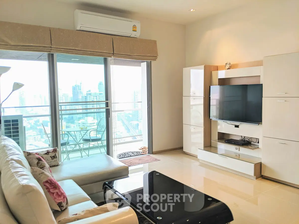Modern living room with city view, sleek furniture, and large windows.